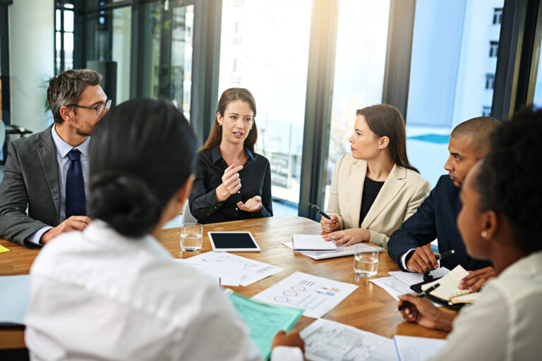 Putting her ideas forward. Cropped shot of a group of businesspeople meeting in the boardroom